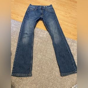 Pair of 29x 32x wrangler retro slim boot cut jeans